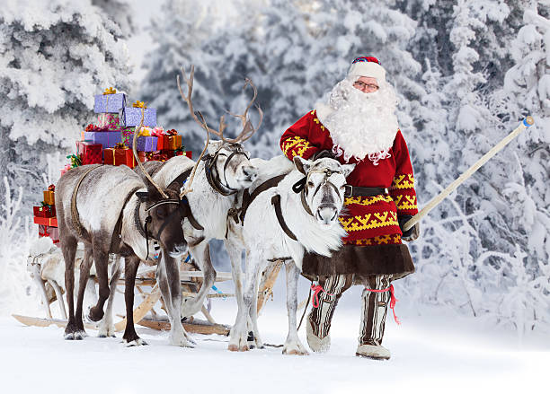istock Santa Claus and his reindeer 499631784