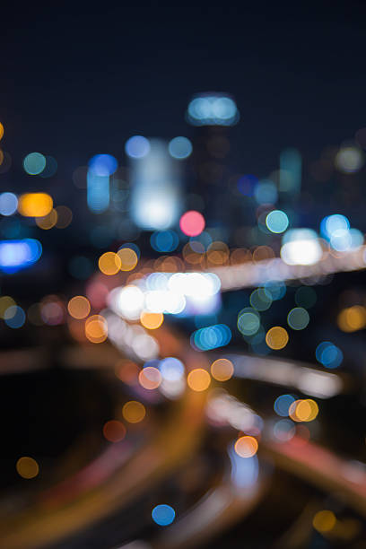 istock Blurred bokeh light city and interchanged road 499631788