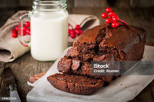 Chocolatebanana Loaf Cake On Paper Stock Photo - Download Image Now - Baked, Baking, Banana