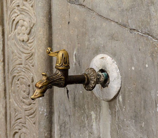 istock Ancient old exterior water tap. Greece. Rhodes 499641173