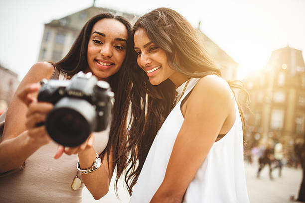 istock tourist in amsterdam looking the pictures 499641209