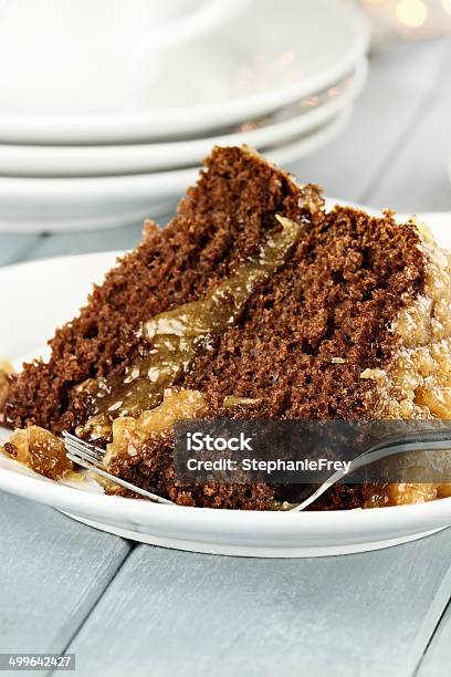 Slice Of German Chocolate Cake Stock Photo - Download Image Now - Chocolate Cake, Coconut, Icing