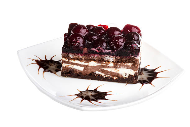 istock Chocolate cake with cherry on top on a white background 499644001