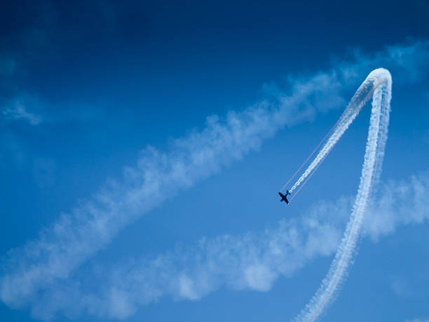 istock Low angle view of an airplane performing airshow 499645307