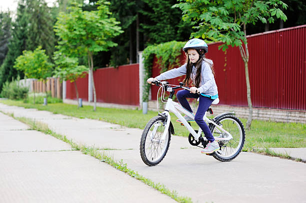 istock Little girl on bike 499646503
