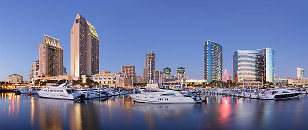 Skyscrapers and Marina - San Diego Skyscrapers and marina at night - panoramic (San Diego, California). marina california stock pictures, royalty-free photos & images