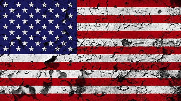 USA flag painted on cracked paint texture. stock photo