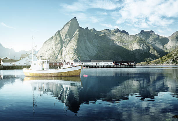 istock sunset - Reine, Lofoten islands, Norway 499649564