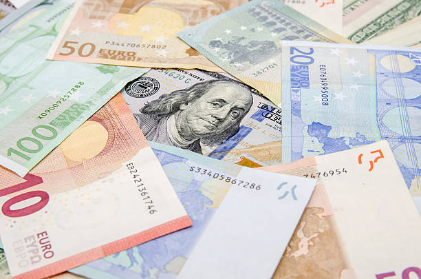 istock Pile of many different us dollars and euro 499649652