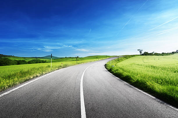 asphalt road in Tuscany, Italy