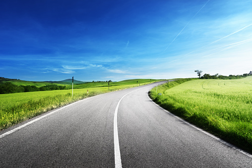 asphalt road in Tuscany, Italy