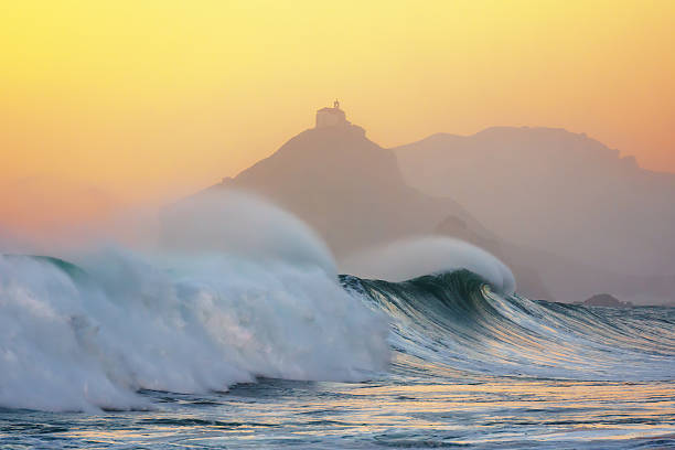 istock wave breaking in Bakio near gaztelugatxe at sunset 499650762