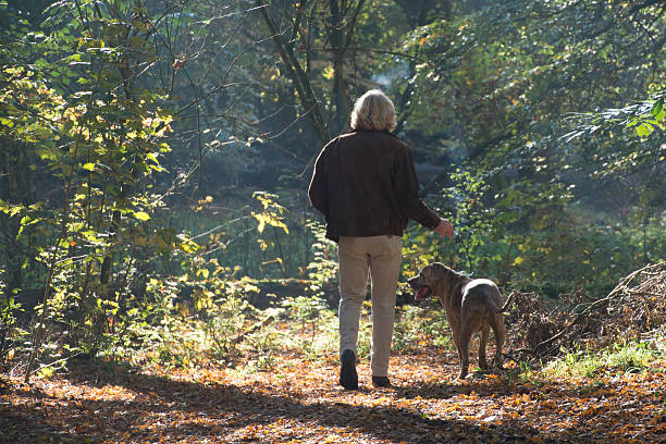 istock Men smoking a cigarette  in the forest 499651266