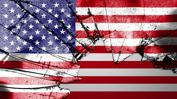 istock USA flag painted on broken glass 499651740