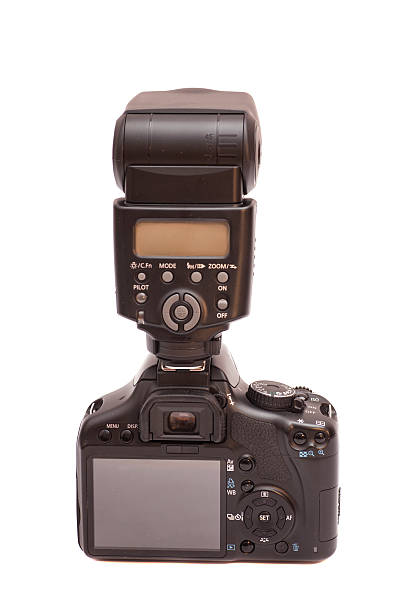 istock Photo camera and flash isolated on white background 499653610