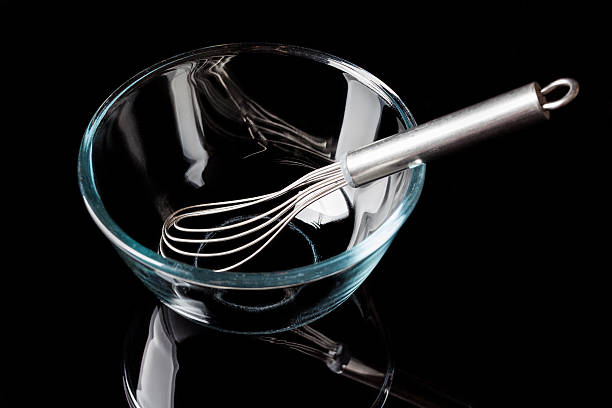 istock Glass bowl on black with whisker inside from high angle 499654488