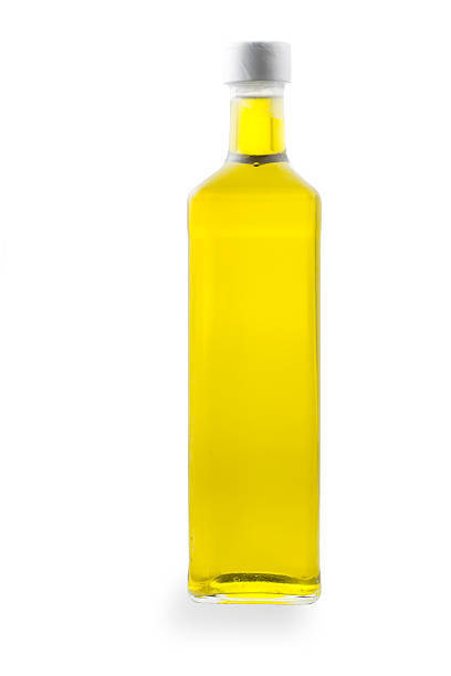 istock New bottle filled with olive oil, isolated 499656058
