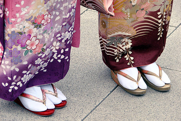 Getas on japanese women feet Getas on japanese women feet geta sandal photos stock pictures, royalty-free photos & images