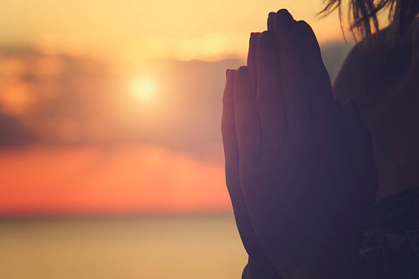 istock Young woman practicing yoga on the beach. 499658856