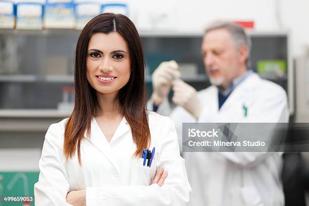 Scientist At Work In A Laboratory Stock Photo - Download Image Now - Adult, Analyzing, Biochemist
