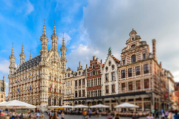 The Grote Markt is the main square of the Flemish city of Leuven and the Town Hall is one of its remarkable buildings bordering the town square. It was built between 1439 and 1463 in a Brabantian late-Gothic style and adorned by statues only in the 19th century, to commemorate prominent personalities of the city history.