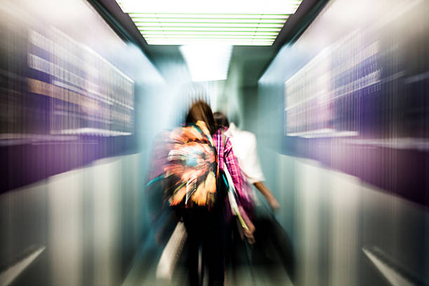 istock Blur motion of passengers walking at airport 499660066
