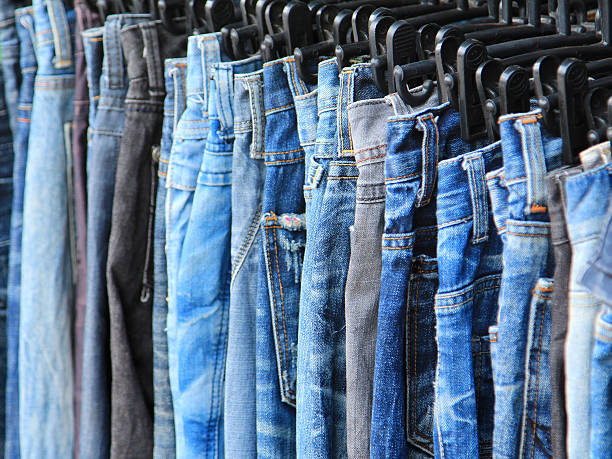 istock Row of hanged jeans 499660689