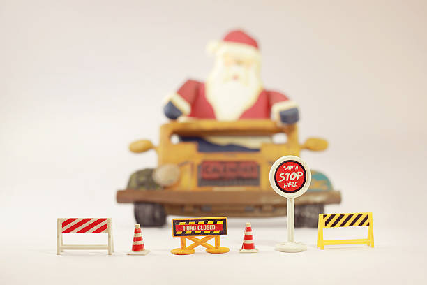 Yellow school bus toy model in Christmas theme.