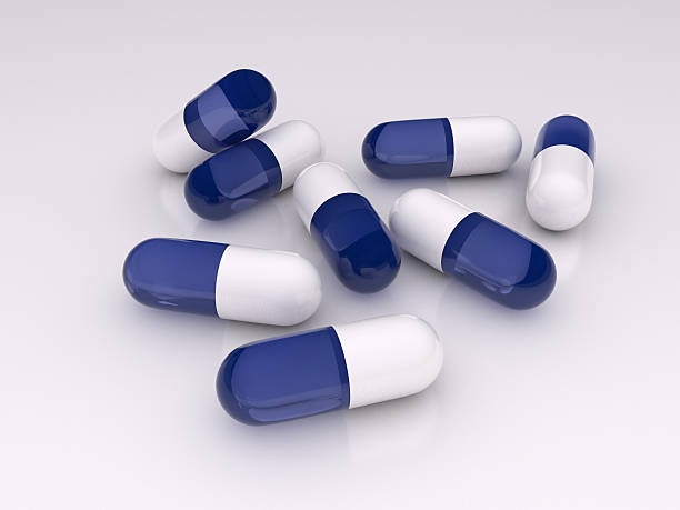 Glossy blue pills stock photo