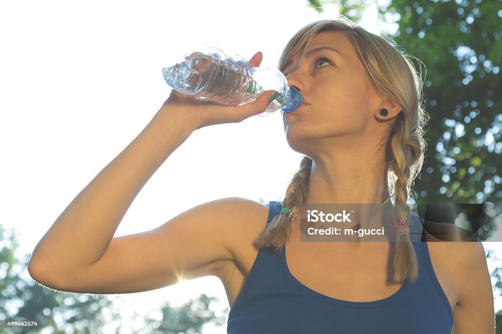 Doing some exercise/running/jogging in the park. 2015 Stock Photo
