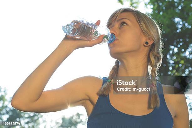 Doing Some Exercise Running Jogging In The Park Stock Photo - Download Image Now - 2015, Adult, Athlete