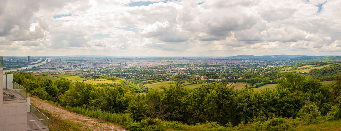 Thia shot was made from Kahlenberg hill in Vienna, Austria on June 2014. The overcast weather brings terrific contrast view for the visitors and photogaphers. The Kahlenberg lies in the Vienna Woods and is one of the most popular destinations for day-trips from Vienna, offering a view over the entire city.