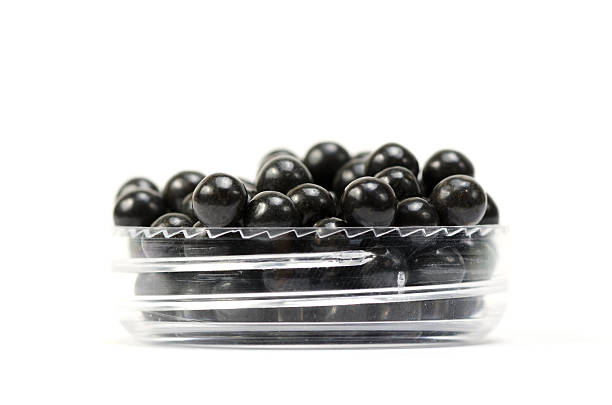 istock Black ball Traditional Medicine pill 499663261