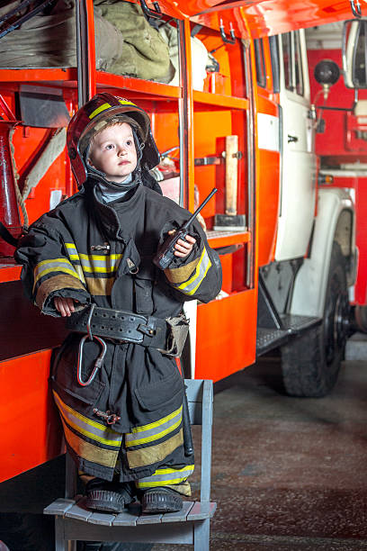 istock Portrait of little firefighter 499664927