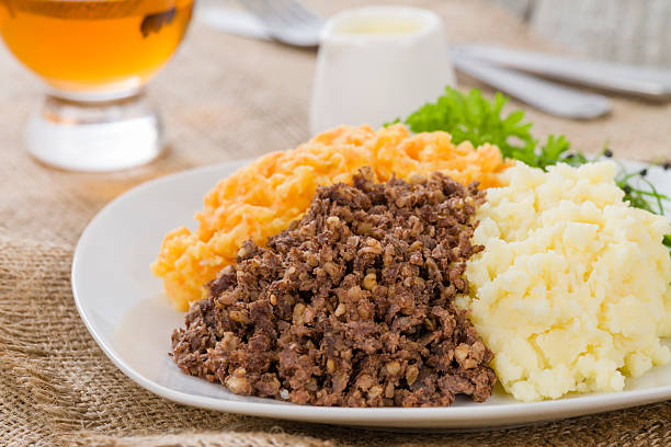 Haggis, Neeps & Tatties Traditional Scottish meal commonly served at Burns' Night. Served with a dram. animal lung stock pictures, royalty-free photos & images