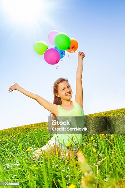 Smiling Girl Holding Colorful Balloons In Summer Stock Photo - Download Image Now - Balloon, Beautiful People, Beauty