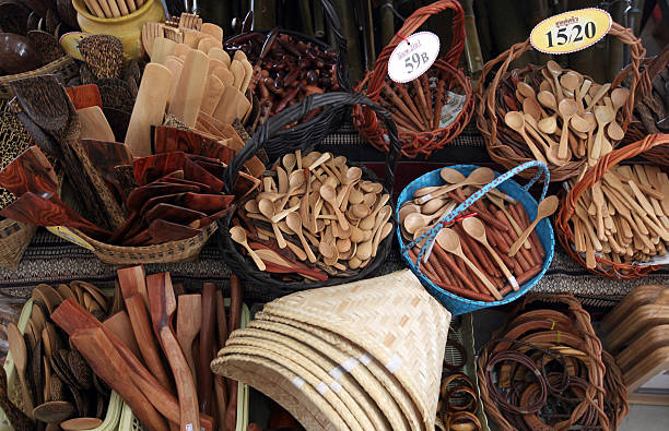 Wooden souvenirs at the market of Amnat Charoen in the province of Amnat Charoen in the Isan in the northeast of Thailand.