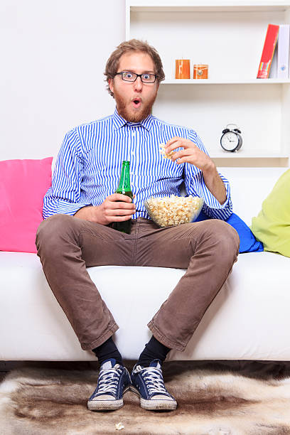 istock Surprised man in front of TV 499675263