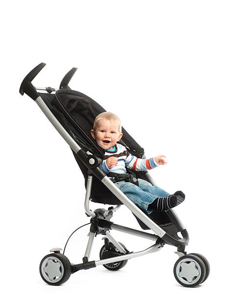 Little boy in baby stroller