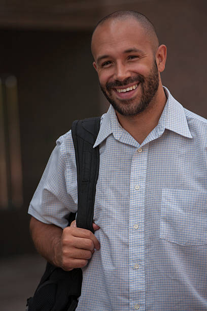 istock Handsome male professional smiling with shoulderbag 499676079