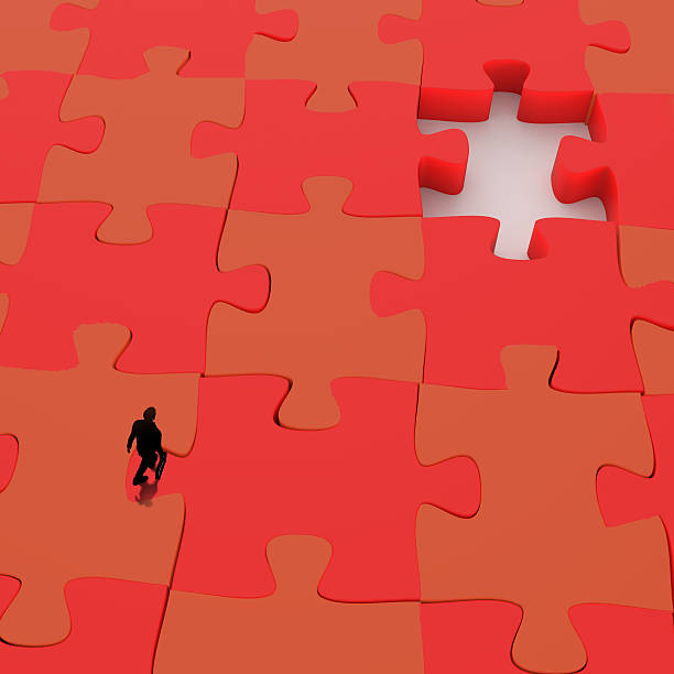 istock businessman walking in Missing 3d puzzle piece as concept 499676223