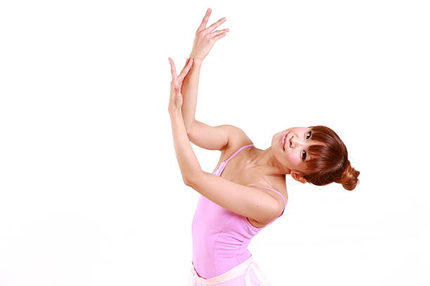 studio shot of young Japanese dancing woman