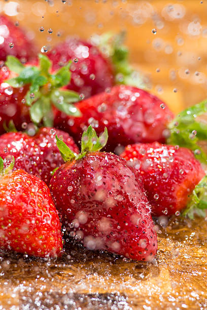 strawberry washed with running water