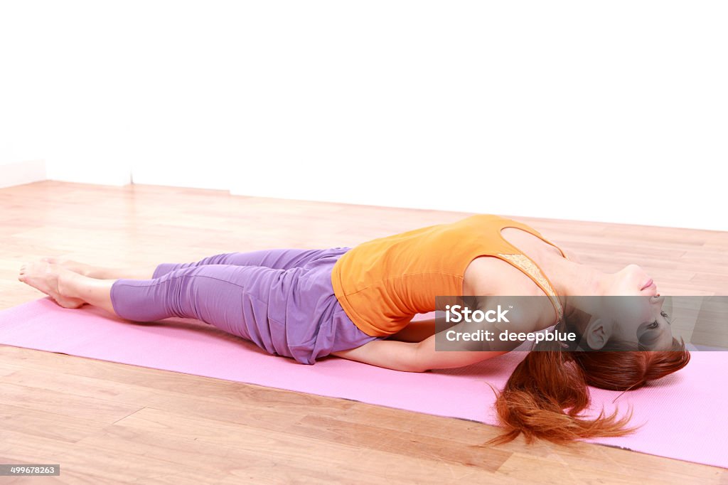 Young Woman Doing YOGA "fish pose" concept shot of woman's life style 20-29 Years Stock Photo