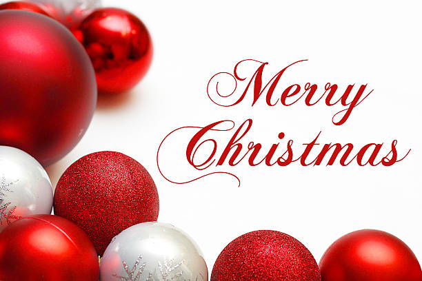 istock Group of Tree Ornaments Framing Merry Christmas Text 499685460