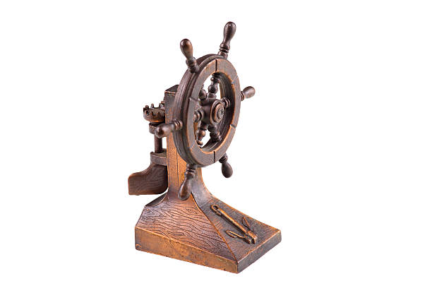 istock The steering wheel of a sailing ship - isolated 499685748