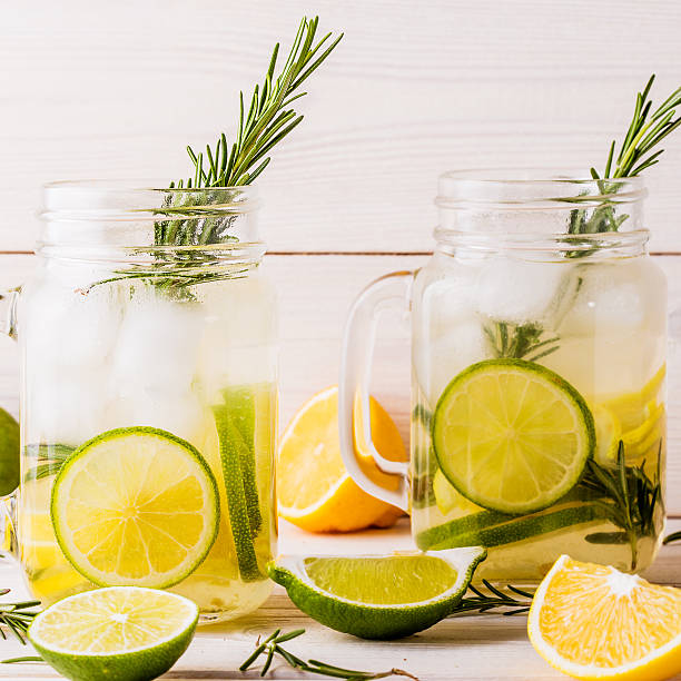istock Homemade lemonade with lime, lemon, rosemary. 499687382