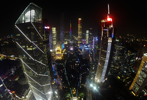 Guangzhou, Сhina - November 23, 2015: General aerial night view of skyscrapers and Canton Tower in Guangzhou city centre, Zhuijang New Town in Southern China