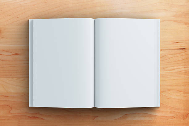istock Blank pages of diary on brown wooden table, mock up 499688838