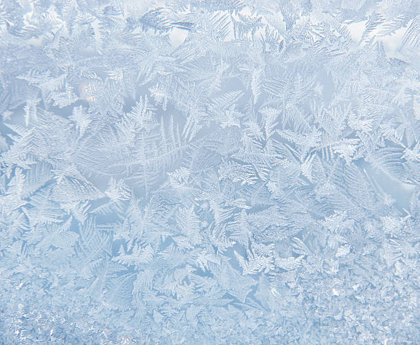 Frost pattern on the window Frost pattern on the window ice crystal photos stock pictures, royalty-free photos & images